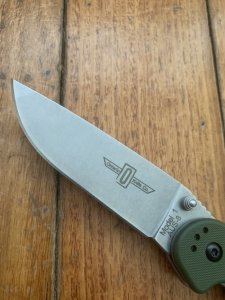 Ontario Knife Company ON8874TC Plain Brushed Silver Edge Folding Knife with Olive Drab Handle