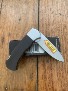 Puma Knife: 2004 Puma 4 Star Mini Folding Lock Knife with Black Buffalo Horn Handle