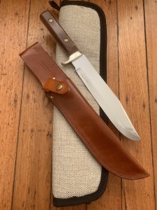 Puma Knife: 1987 Puma Big Big Bowie knife with Wooden Handle in original Tan Leather Sheath & Case