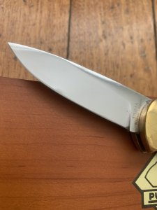 Puma Knife: Puma Original Scrimshawed Puma Aligator 4 Star Folding Lock Blade Knife with Presentation Box