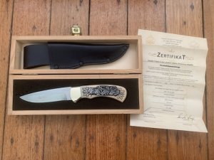 Puma Knife: Puma 1990 American Wildlife Collection 4 star Fixed Blade Knife with White Micarta Handle Original Box and matching Warranty #025/400