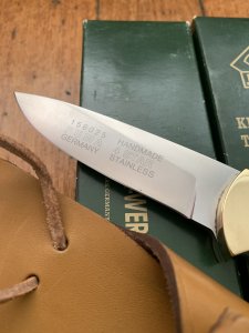 Puma Knife: Puma Original 1994 4 Star Fixed Blade Knife with Black Micarta Handle in Original Green Box