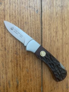 Puma Knife: 2010 Puma 4 Star Mini Folding Lock Knife with Red Jigged Bone Handle