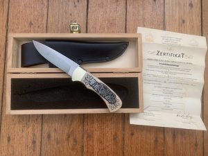 Puma Knife: Puma 1990 American Wildlife Collection 4 star Fixed Blade Knife with White Micarta Handle Original Box and matching Warranty #025/400