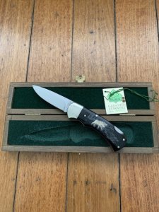 Puma Knife: Puma 1990 American Wildlife Collection 'Moose' model 715 4 star Folding Knife with Ebony Handle Original Box and matching Warranty #169/200