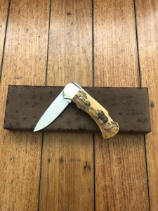 Puma Knife: Puma 1987 Original Scrimshawed 4 Star Folding Lock Blade Knife with Cape buffalo in Presentation Box