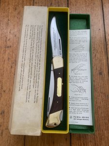Puma Rare Model 971 Plainsman 1969 Saw and Blade Folding Knife with original box & Paperwork #96011