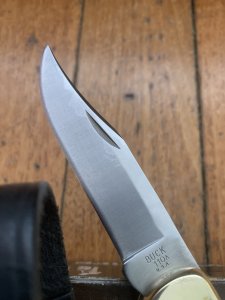 Buck Knife: Buck 1988 Model 110 Hunter Folding Lock Knife with Leather Pouch and Original Box