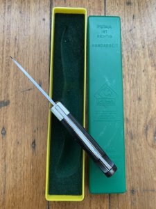 Puma Knife: Puma Original 1996 4 Star Folding Lock Blade Knife with Black Ebony Micarta Handle in Box