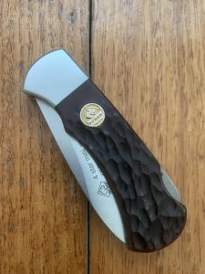 Puma Knife: 2010 Puma 4 Star Mini Folding Lock Knife with Red Jigged Bone Handle