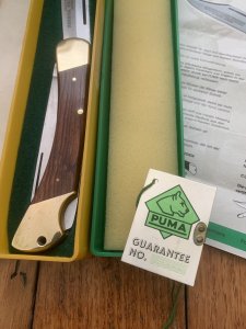 Puma Rare Model 971 Game Warden 1989 Saw and Blade Folding Knife with original box & Paperwork #45982
