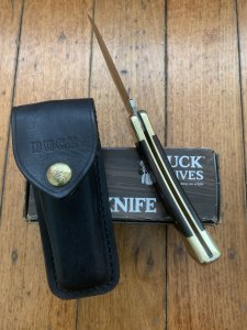 Buck Knife: Buck 1988 Model 110 Hunter Folding Lock Knife with Leather Pouch and Original Box