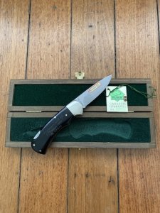 Puma Knife: Puma 1990 American Wildlife Collection 'Moose' model 715 4 star Folding Knife with Ebony Handle Original Box and matching Warranty #169/200