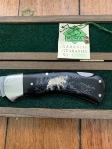 Puma Knife: Puma 1990 American Wildlife Collection 'Moose' model 715 4 star Folding Knife with Ebony Handle Original Box and matching Warranty #169/200