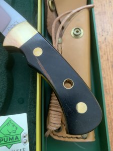 Puma Knife: Puma Original 1992 4 Star Fixed Blade Knife with Black Ebony Handle in Original Green and Yellow Box #26291