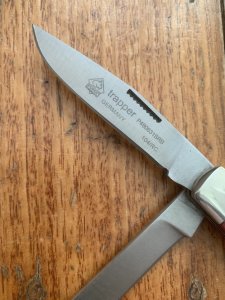 Puma Knife: Puma 2004 Trapper Lockback Knife with Red Smooth Bone Handle