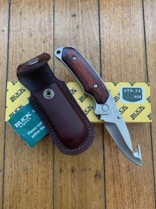 Buck Knife: 2008 Buck Gut Hook Alpha Hunter Folding Knife with Rosewood Laminated Handle & Pouch