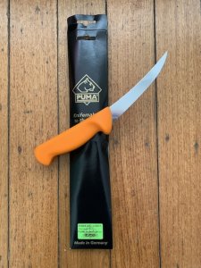 Puma Knife: PUMA German Made boning knife, Bent,  semi-flex, 13 cm Blade with Orange Handle