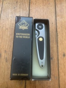 Puma Knife: Puma HUNTEC II Plain Edge Black Handled Linerlock Folding Knife in Puma Box