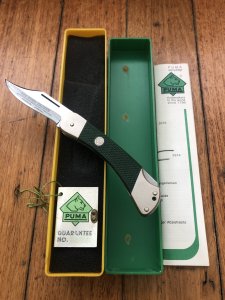 Puma Knife: Puma Rare 1980 Packer Folding Knife in original Green Box # 14081