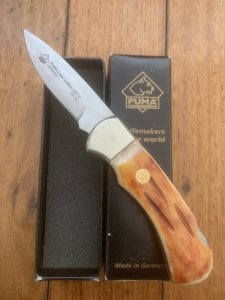 Puma Knife: 2008 Puma 4 Star Full Sized Folding Lock Knife with Buffalo Bone Handle