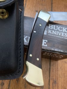 Buck Knife: Buck 1988 Model 110 Hunter Folding Lock Knife with Leather Pouch and Original Box