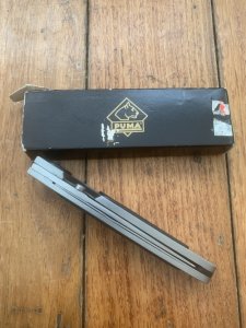 Puma Knife: Puma HUNTEC II Plain Edge Black Handled Linerlock Folding Knife in Puma Box