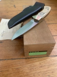Puma Knife: Puma 1990 American Wildlife Collection 4 star Fixed Blade Knife with White Micarta Handle Original Box and matching Warranty #025/400