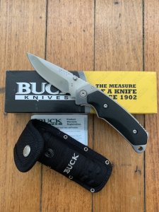 Buck Knife: 2006 Model Buck Alpha Hunter Folding Knife with Black Rubberised Handle & Pouch