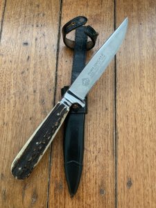 Puma Knife: Pre-64 'USED' 3596 GNICKER Knife with Stag Handle In Original Forest Green Sheath