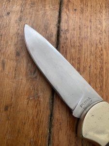 Puma Knife: Puma Original 1977 4 Star Folding Lock Blade Knife with Black Ebony Micarta Handle #29771