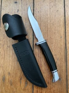 Buck Knife: Buck 2005 Woodsman 102 with Black Phenolic Handle & Leather Sheath