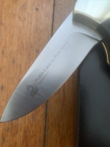 Puma Knife: Puma 2025 Date Stamp 4 Star Folding Lock Blade Knife with Black Buffalo Handle