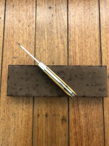 Puma Knife: Puma 1987 Original Scrimshawed 4 Star Folding Lock Blade Knife with Cape buffalo in Presentation Box