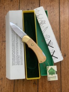 Puma Knife: Puma Original 1982 4 Star Folding Lock Blade Knife with Ivory Micarta Handle in Original Box #16281