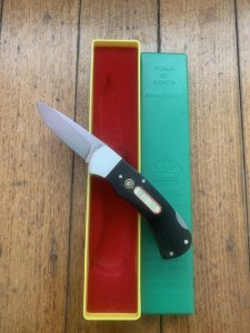 Puma Knife: Puma Original 1979 4 Star Folding Lock Blade Knife with Black Ebony Micarta Handle in Original Box #13971