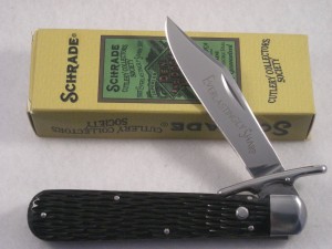 Schrade SCCS2010 Cutlery Collectors Society swing guard button lock folding knife.