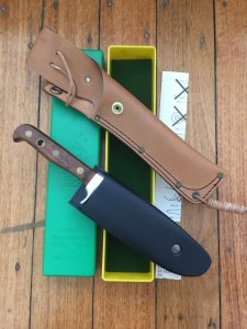 Puma Knife: Puma  Current Model Automesser Plumwood Handle White Hunter Knife