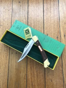 Puma Knife: Puma 1974 Trail Boss/Emperor 975 Folding Knife with Jacaranda Handle Original Box and matching Warranty