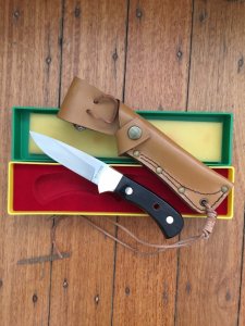 Puma Knife: Puma Original 1978 4 Star Fixed Blade Knife with Black Buffalo Handle in Original Green/Yellow Box #45874