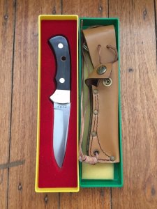 Puma Knife: Puma Original 1978 4 Star Fixed Blade Knife with Black Buffalo Handle in Original Green/Yellow Box #45874