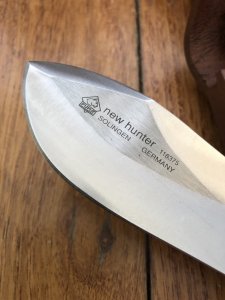 Puma Knife: Puma Rare Original 2001 New Hunter Model 118375 in original sheath #57102.