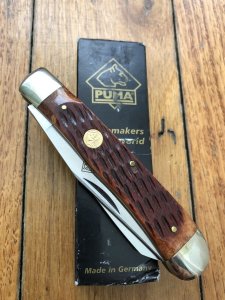 Puma Knife: Puma Large Trapper Lockback Knife with Jigged Red Bone Handle
