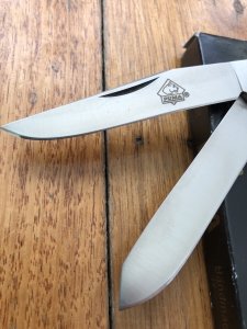 Puma Knife: Puma Large Trapper Lockback Knife with Jigged Red Bone Handle