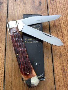Puma Knife: Puma Large Trapper Lockback Knife with Jigged Red Bone Handle