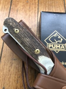 Puma Knife: Puma Skinner II Laser Cut with Stag Handle and leather sheath