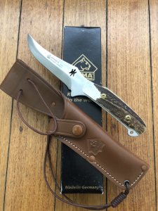 Puma Knife: Puma Skinner II Laser Cut with Stag Handle and leather sheath