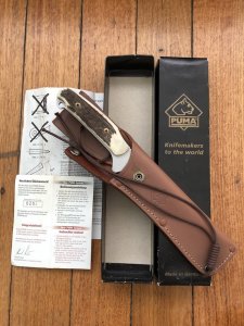 Puma Knife: Puma Rare Original 2002 New Hunter Model 118375 in original sheath and box.