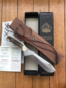 Puma Knife: Puma Rare Original 2002 New Hunter Model 118375 in original sheath and box.
