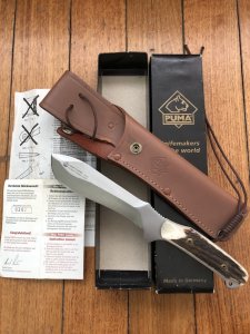 Puma Knife: Puma Rare Original 2002 New Hunter Model 118375 in original sheath and box.